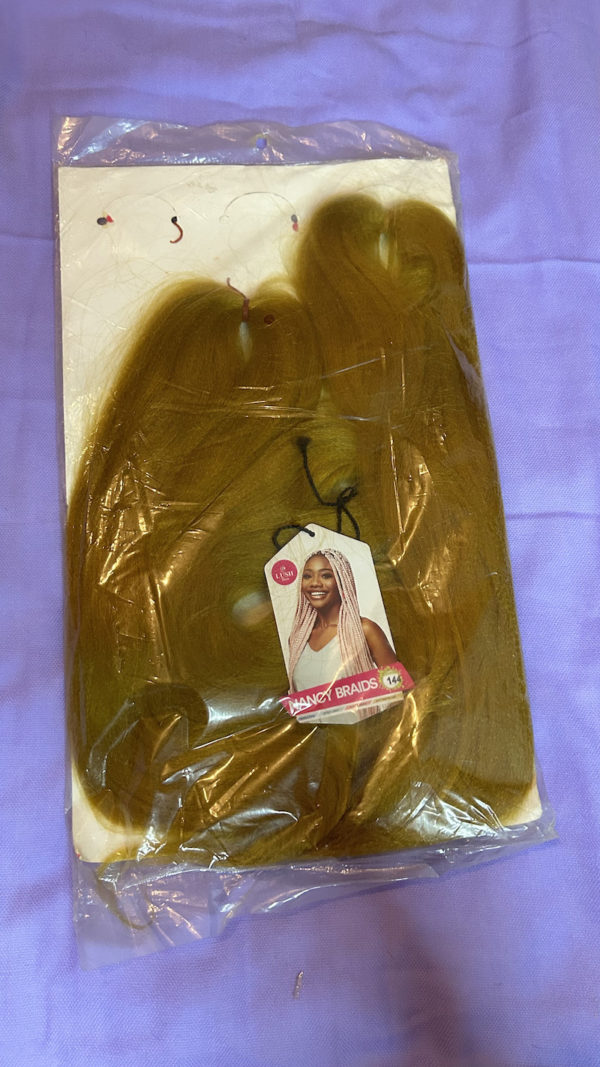 Back view of lush hair Nancy braids extension. Colour Gold